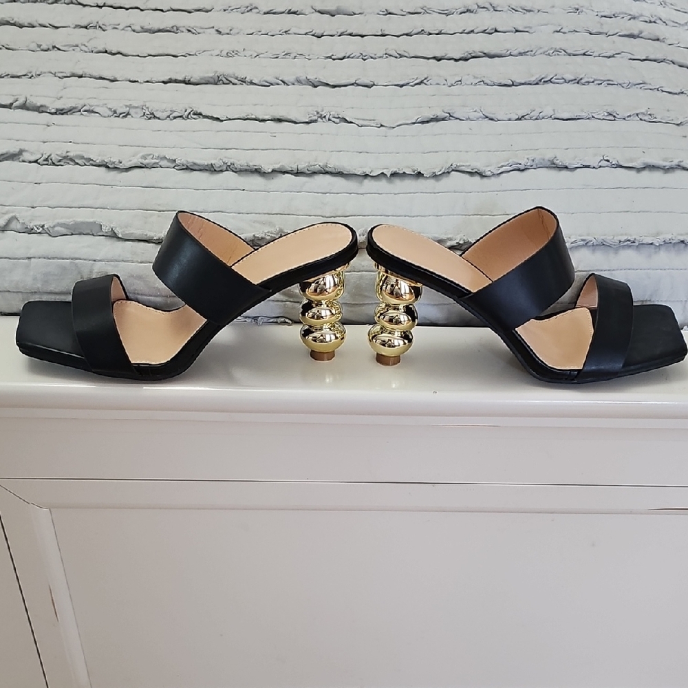 Chic Black Heels with Gold Spiral Accents